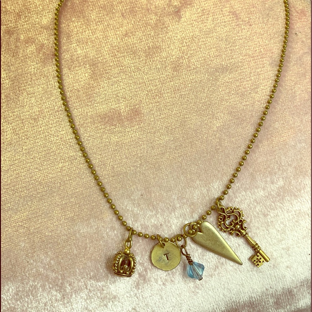 Jewel kade necklace with charms